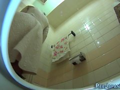 Asians urinate on spycam