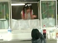 Cute Japanese babe in a food truck gets her pussy fingered