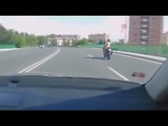 Naked Sexy Girl rides her Crotch Rocket down the street